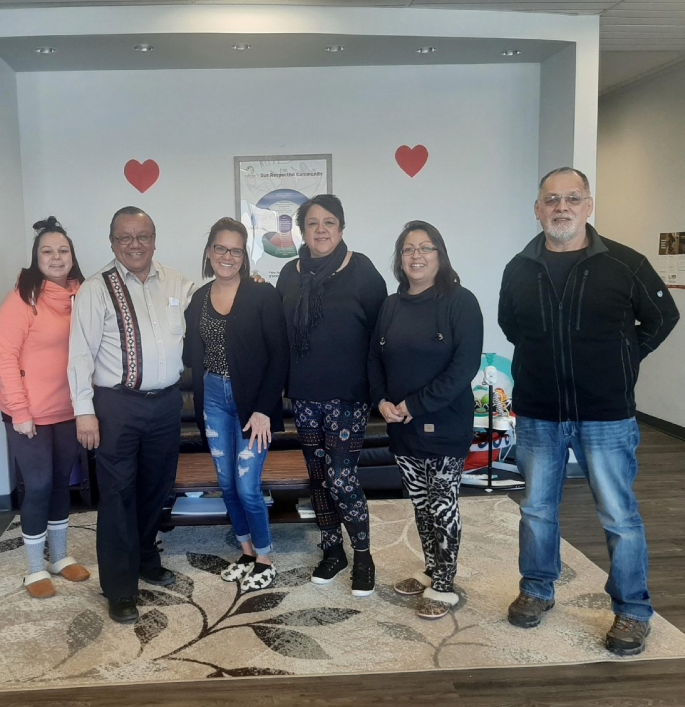 Rocky Bay Family Services staff and Chief pictured with Glen Hare